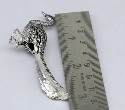Handmade 925 sterling silver Lord Kartikeya peacock statue and temple utensils, detailed silver artifact representing Murugan's vahan.