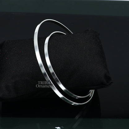 Sterling silver double-layer bangle bracelet with plain design, handmade tribal jewelry for women from India.