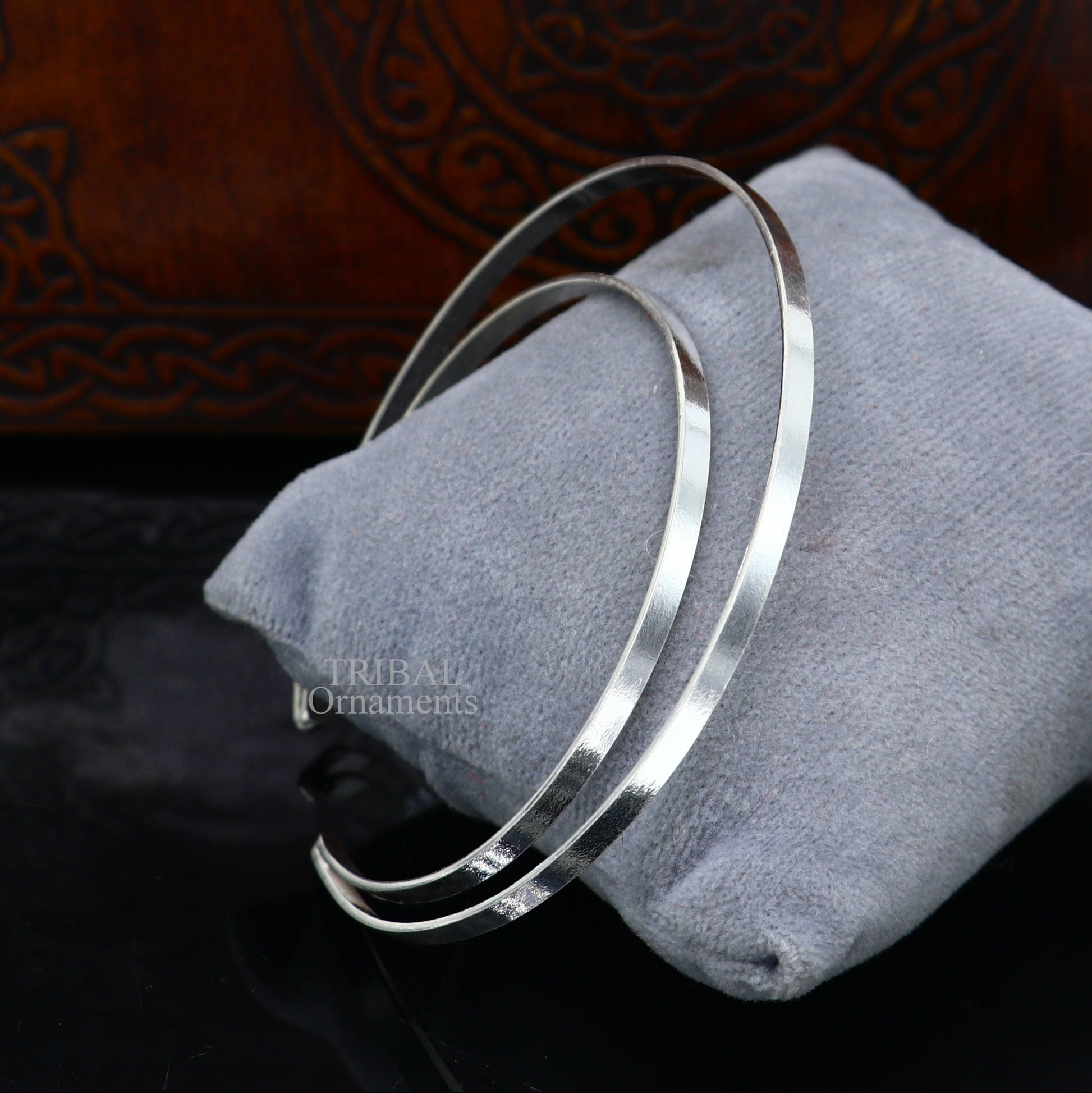 Sterling silver double layer bangle bracelet with plain design from TRIBAL ORNAMENTS, showcasing a sleek, handcrafted tribal jewelry piece.