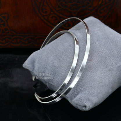 Sterling silver double layer bangle bracelet with plain design from TRIBAL ORNAMENTS, showcasing a sleek, handcrafted tribal jewelry piece.