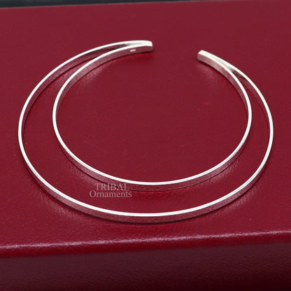 Sterling silver double layer plain bangle bracelet from TRIBAL ORNAMENTS, showcasing a sleek, handmade cuff design with tribal jewelry style.