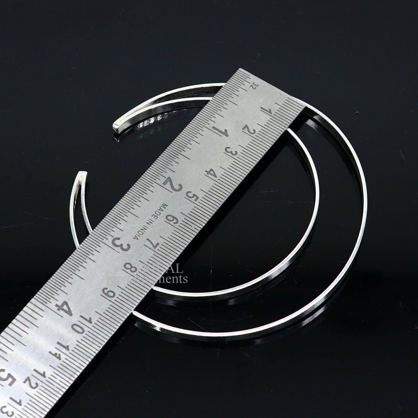 Sterling silver double-layer plain bangle bracelet by TRIBAL ORNAMENTS, handcrafted Indian cuff jewelry with minimalist design.