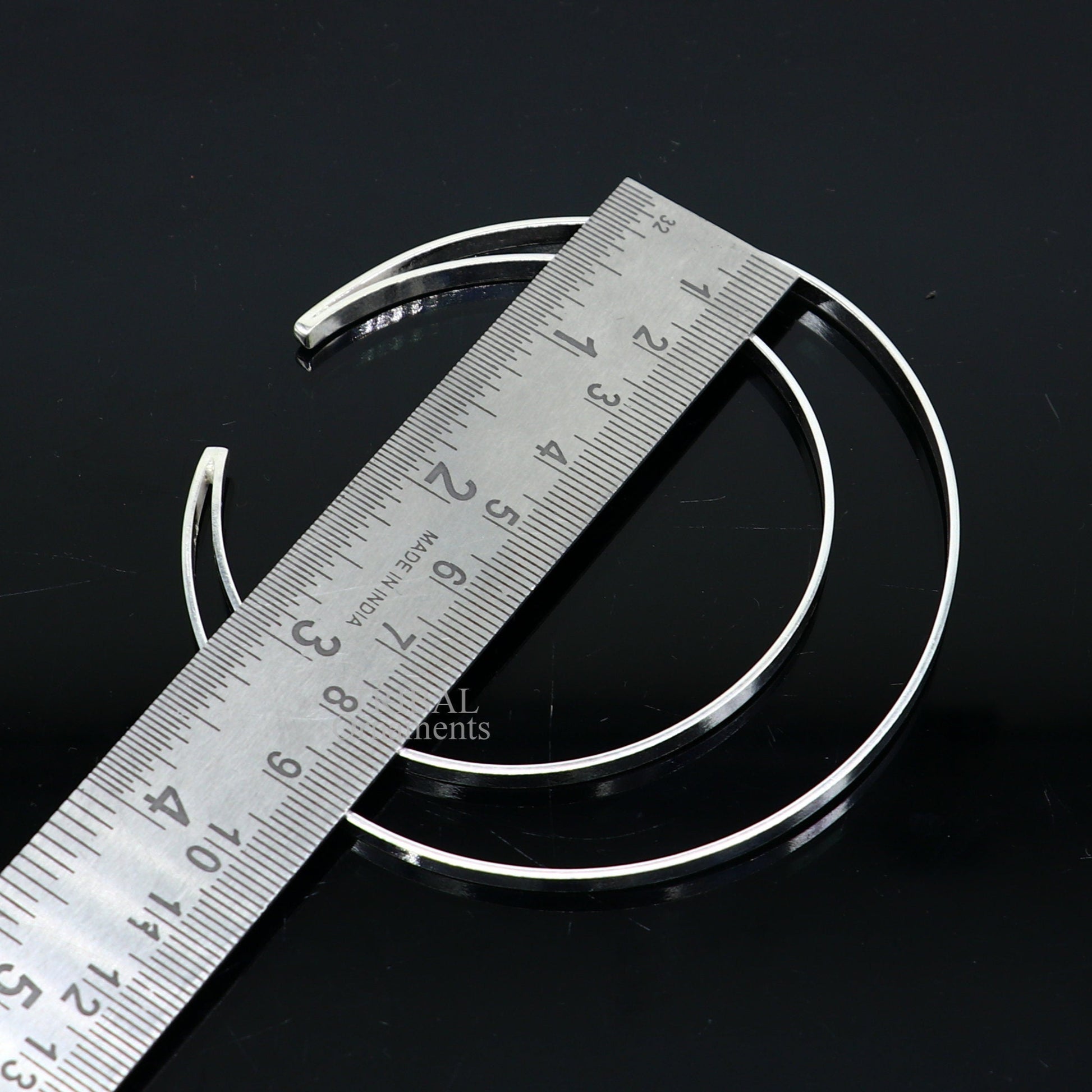 Sterling silver double-layer plain bangle bracelet by TRIBAL ORNAMENTS, handcrafted Indian cuff jewelry with minimalist design.