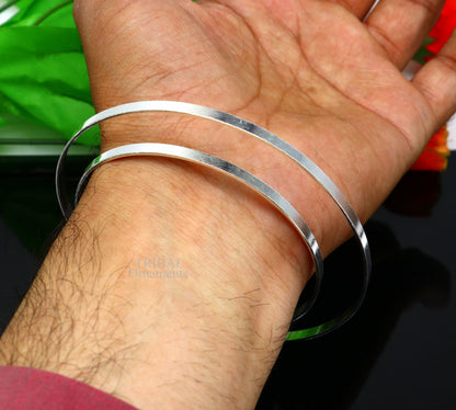 Sterling silver double-layer plain bangle bracelet from TRIBAL ORNAMENTS, handcrafted tribal jewelry with a sleek cuff design.