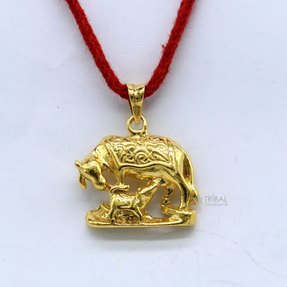 925 sterling silver Kamdhenu cow and calf pendant with gold polish, elegant handmade jewelry by TRIBAL ORNAMENTS.