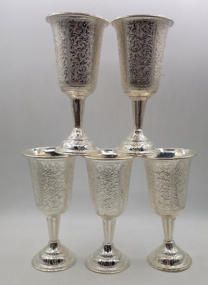 Set of 6 925 sterling silver wine glasses with engraved floral designs by TRIBAL ORNAMENTS, elegant silver drinkware for gifting.