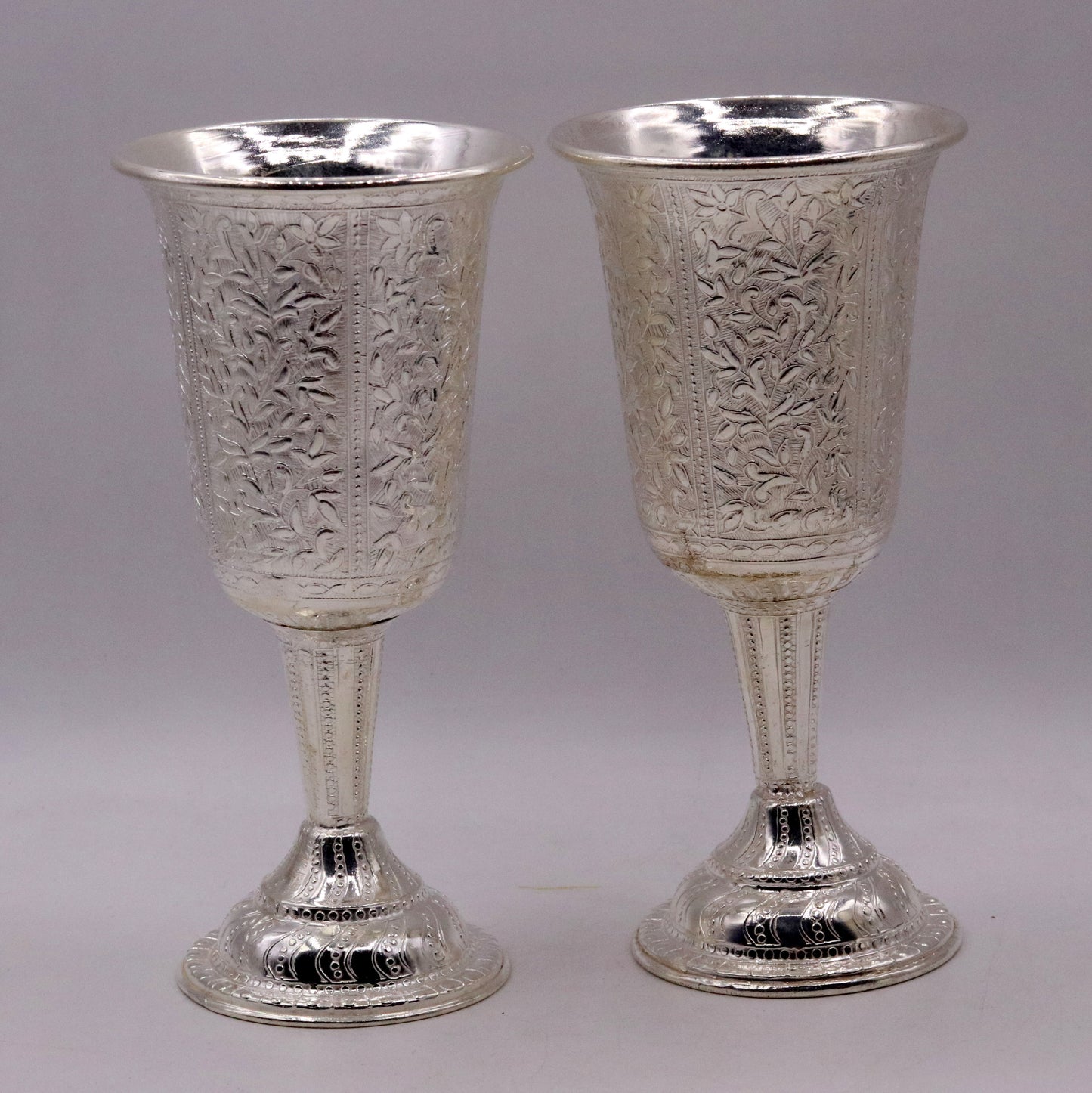 Set of 6 handmade 925 sterling silver wine glasses with engraved floral designs by Tribal Ornaments, perfect for gifting.