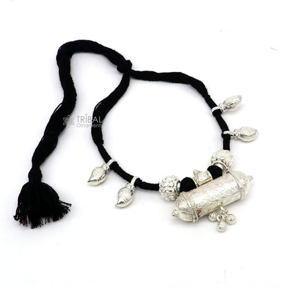 Sterling silver ethnic tribal necklace and choker set with black thread, featuring traditional design and pendant, handmade bridal jewelry.