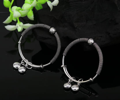 Sterling silver vintage design adjustable baby bangle with charm, handmade delicate jewelry for newborns by TRIBAL ORNAMENTS.