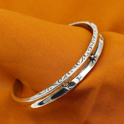 Sterling silver vintage design cuff bracelet by Tribal Ornaments, stylish unisex jewelry with intricate handcrafted details.