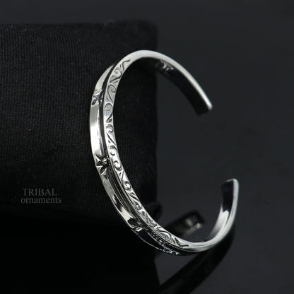 Sterling silver vintage cuff bangle bracelet from Tribal Ornaments, unisex stylish handmade jewelry with intricate design.