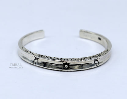 Sterling silver vintage cuff bangle bracelet by TRIBAL ORNAMENTS, unisex stylish jewelry with intricate handmade design.