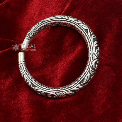 Sterling silver handmade tribal bangle bracelet featuring intricate chitai work, customized tribal jewelry by TRIBAL ORNAMENTS.