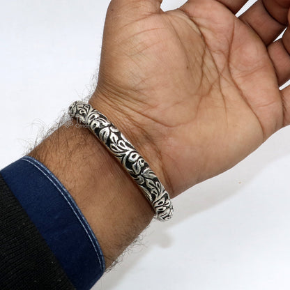 Sterling silver handmade tribal bangle bracelet with intricate chitai work, customized tribal jewelry by TRIBAL ORNAMENTS.