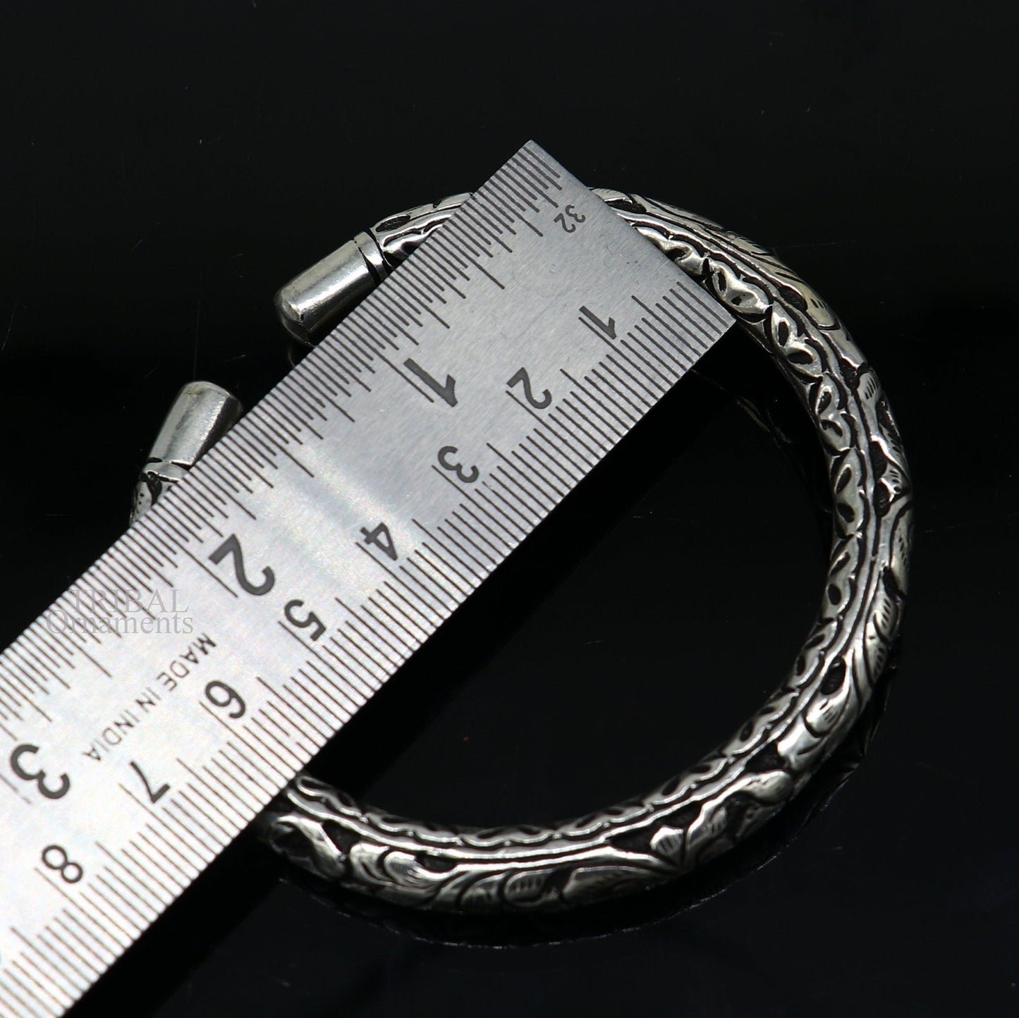 Sterling silver tribal bangle cuff with chitai work, handmade unisex jewelry featuring customized ethnic tribal design.