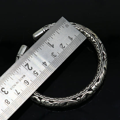 Sterling silver tribal bangle cuff with chitai work, handmade unisex jewelry featuring customized ethnic tribal design.