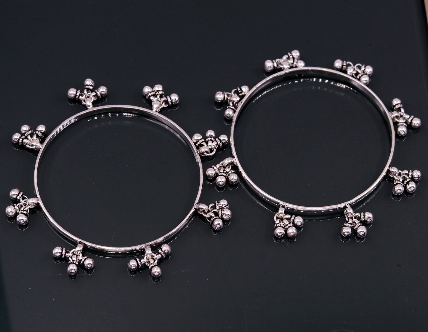 Sterling silver handmade charm bangle bracelet with tribal design by TRIBAL ORNAMENTS, perfect for tribal belly dance jewelry.