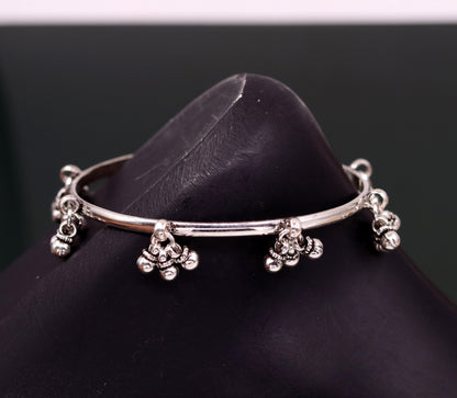 Sterling silver handmade charm bangle bracelet with tribal design, perfect for tribal belly dance jewelry, by TRIBAL ORNAMENTS.