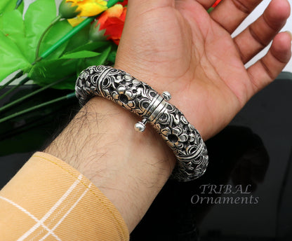 Handmade 925 sterling silver vintage flower work bangle bracelet by TRIBAL ORNAMENTS, traditional wedding jewelry design.