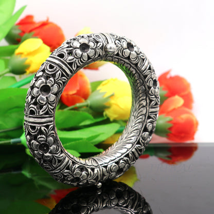 Handmade 925 sterling silver floral vintage bangle bracelet by TRIBAL ORNAMENTS, showcasing intricate traditional wedding jewelry design.