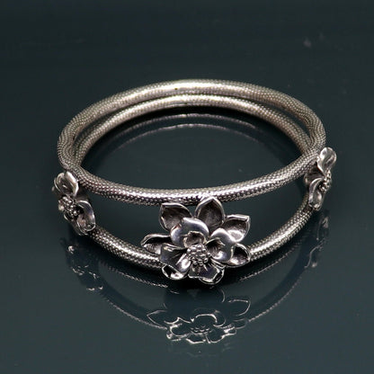 Handmade 925 sterling silver vintage flower design bangle bracelet by TRIBAL ORNAMENTS, traditional wedding jewelry style.