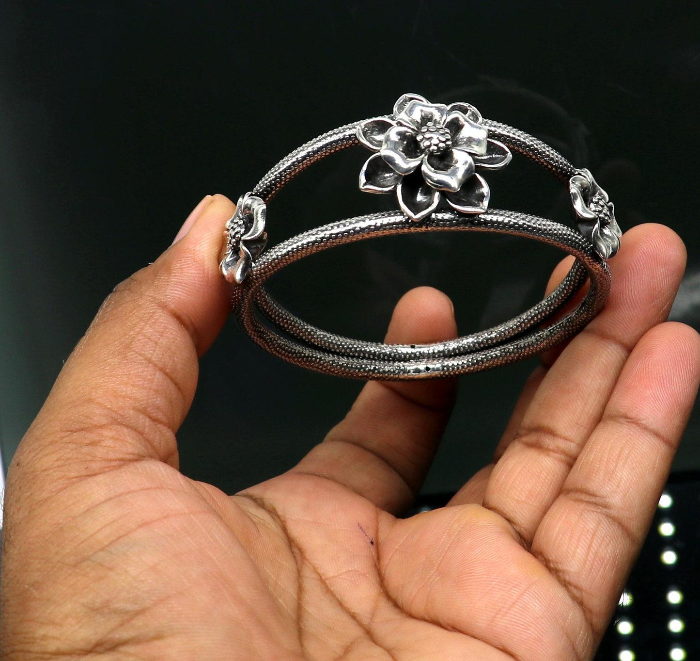 925 sterling silver handmade floral bangle bracelet by Tribal Ornaments with vintage design, traditional wedding jewelry style.
