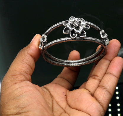 925 sterling silver handmade floral bangle bracelet by Tribal Ornaments with vintage design, traditional wedding jewelry style.