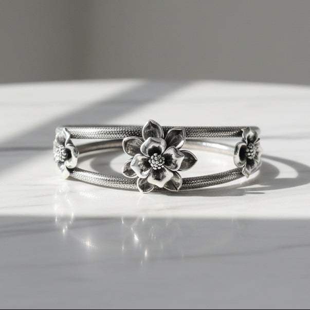 Sterling silver handmade floral vintage bangle bracelet with traditional wedding jewelry design by TRIBAL ORNAMENTS.