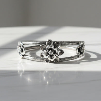 Sterling silver handmade floral vintage bangle bracelet with traditional wedding jewelry design by TRIBAL ORNAMENTS.
