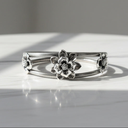 Sterling silver handmade floral vintage bangle bracelet with traditional wedding jewelry design by TRIBAL ORNAMENTS.
