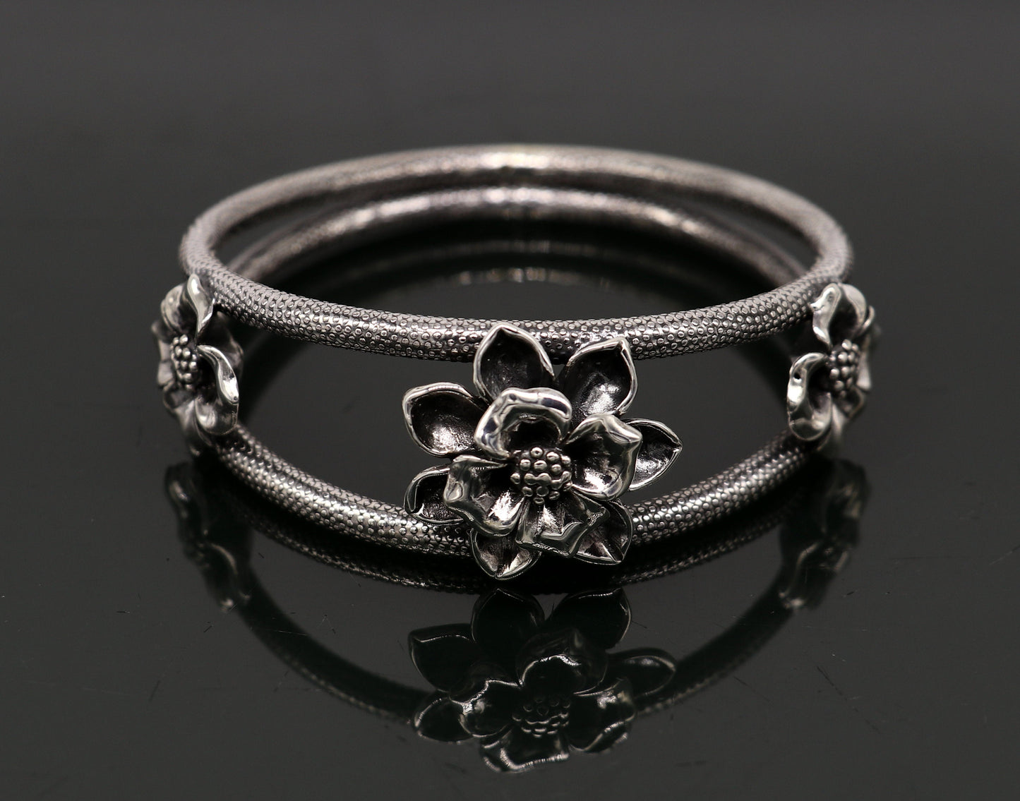 Sterling silver handmade floral bangle bracelet with vintage design, traditional wedding jewelry by TRIBAL ORNAMENTS.