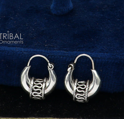 Sterling silver handmade hoops earrings with Bali antique style, unisex, customized, and traditional jewelry from Rajasthan, India.
