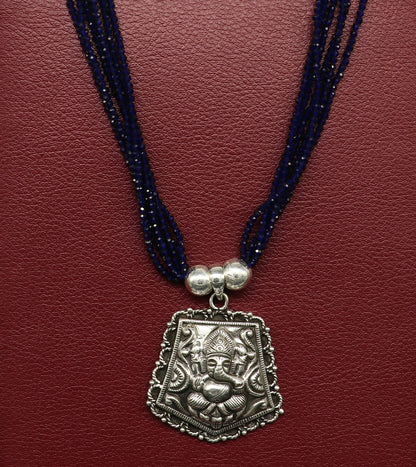 925 sterling silver Ganesha pendant with purple navy jade beads on an adjustable tribal jewelry necklace set.
