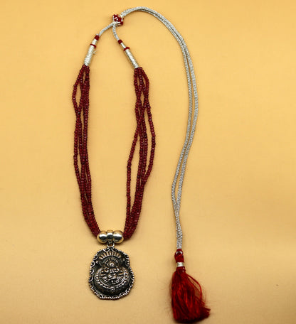 Sterling silver Krishna pendant with purple jade beads on adjustable tribal necklace, handcrafted tribal jewelry set.