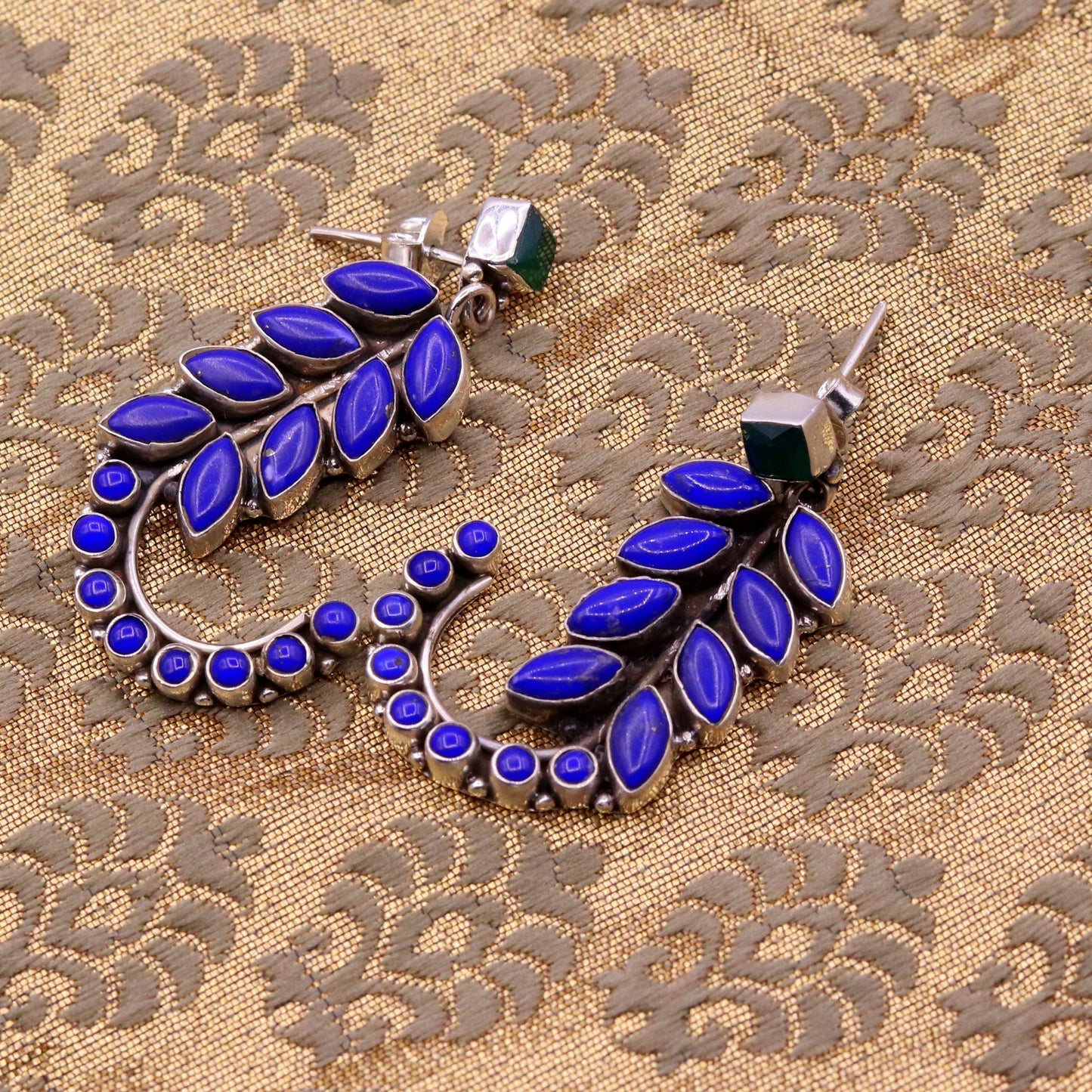 925 Sterling silver leaf-style gemstone jadau stud earrings by TRIBAL ORNAMENTS, intricate handcrafted silver ear jewelry.
