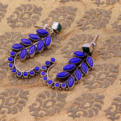 925 Sterling silver leaf-style gemstone jadau stud earrings by TRIBAL ORNAMENTS, intricate handcrafted silver ear jewelry.