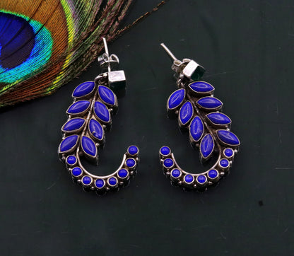 Sterling silver leaf-style gemstone jadau stud earrings by Tribal Ornaments, handcrafted silver ear jewelry for gifting.