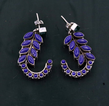 Sterling silver handmade leaf-style gemstone jadau stud earrings by TRIBAL ORNAMENTS, elegant silver jewelry for gifting.