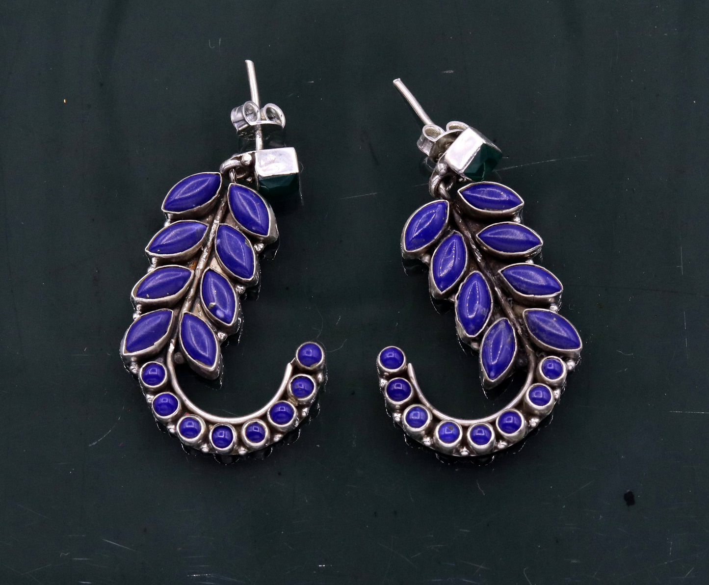 Sterling silver leaf-style gemstone jadau stud earrings by TRIBAL ORNAMENTS, handcrafted silver ear jewelry for gifting.