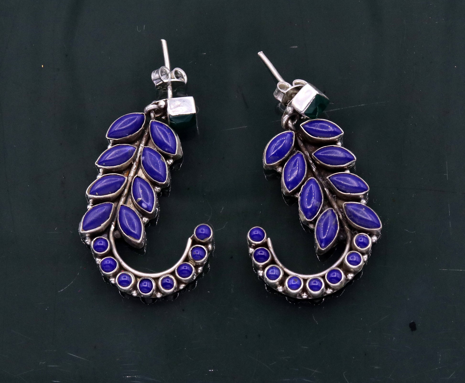 Sterling silver leaf-style gemstone jadau stud earrings by TRIBAL ORNAMENTS, handcrafted silver ear jewelry for gifting.