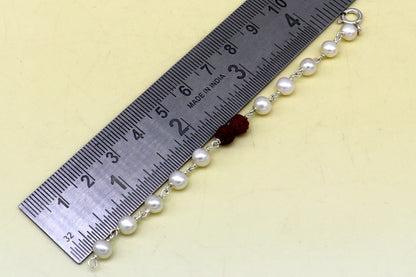 925 sterling silver baby bracelet with white pearl beads and rudraksha, handmade kids jewelry by TRIBAL ORNAMENTS