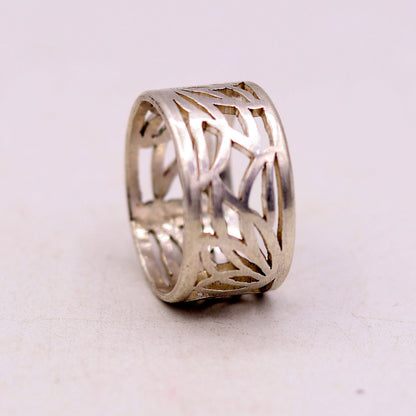 Unisex 925 sterling silver handmade ring featuring intricate horse, camel, and elephant design, adjustable band by TRIBAL ORNAMENTS.