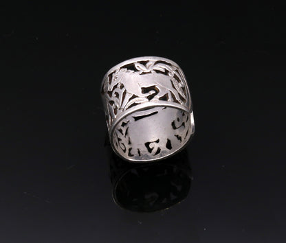 Unisex 925 sterling silver handmade ring featuring detailed horse, camel, and elephant designs, adjustable band by TRIBAL ORNAMENTS.