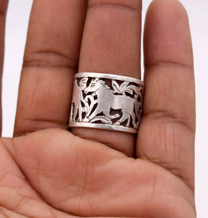 Unisex 925 sterling silver handmade ring with detailed horse, camel, and elephant design, adjustable band by TRIBAL ORNAMENTS.