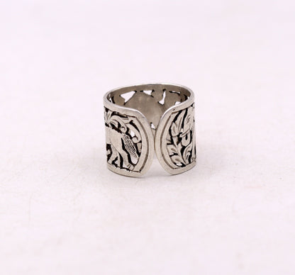 Unisex sterling silver handmade ring with detailed horse, camel, and elephant design, adjustable band by Tribal Ornaments.