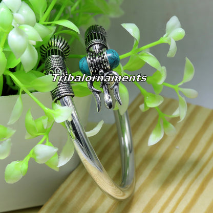 Sterling silver turquoise stone Shiva bangle cuff bracelet by TRIBAL ORNAMENTS, unisex jewelry with intricate design and craftsmanship.
