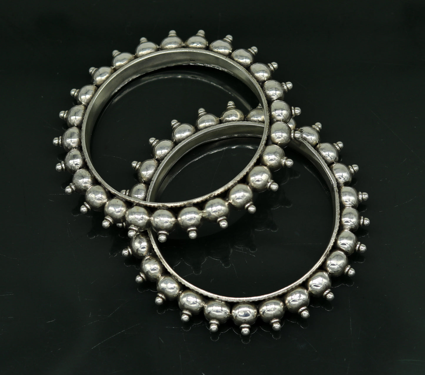 Sterling silver handmade vintage bangle bracelet with intricate design, perfect for weddings or personalized gift jewelry.