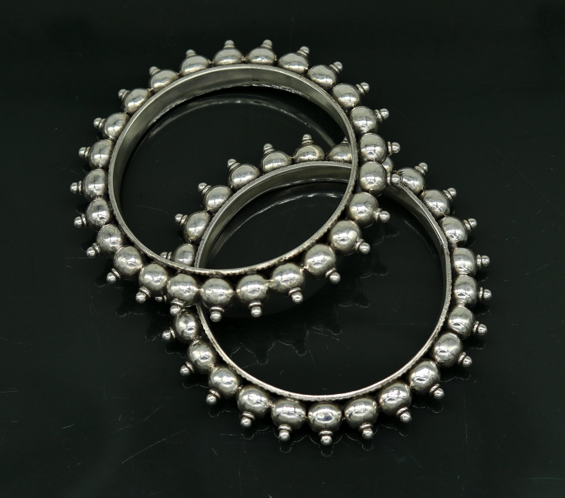 Sterling silver handmade vintage bangle bracelet with intricate design, perfect for weddings or personalized gift jewelry.
