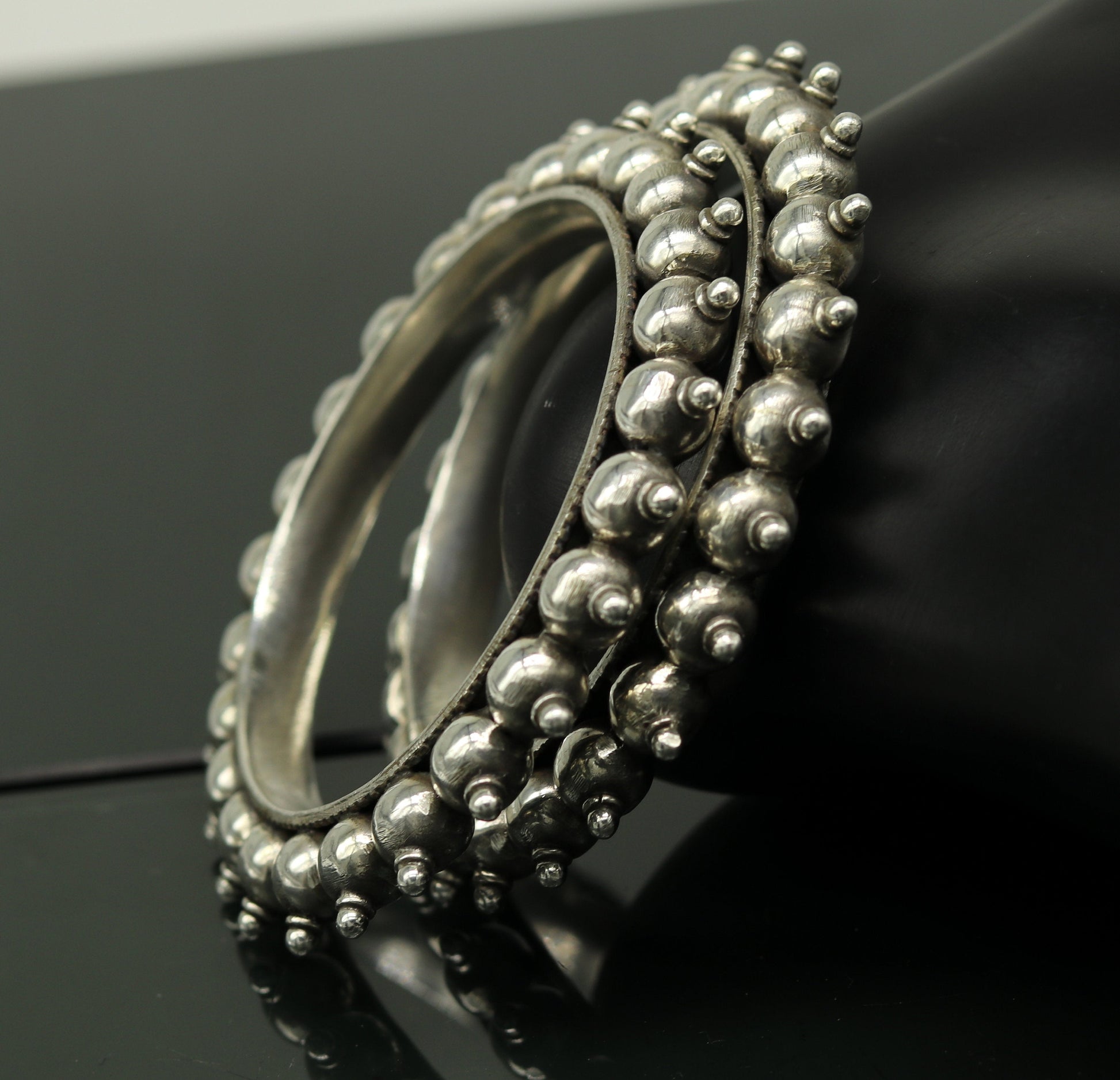 Sterling silver handmade vintage bangle bracelet by TRIBAL ORNAMENTS, featuring customized design, perfect for weddings or personalized gifts.