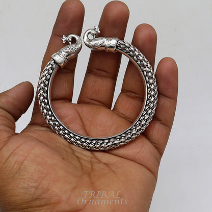 Sterling silver handmade vintage peacock bangle bracelet with intricate design, unisex, customizable hip-hop jewelry by Tribal Ornaments.